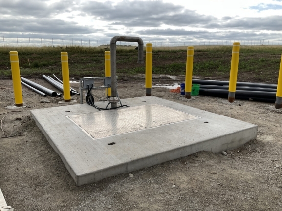 Fenced Enclosure Housing Pump Station and Companion Systems