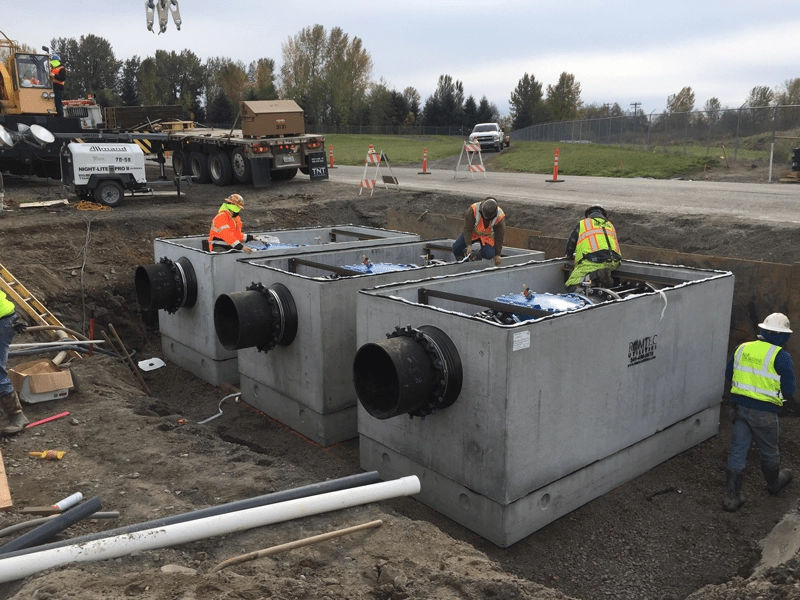 Three Prefabricated Valve Aseemblies Being Placed