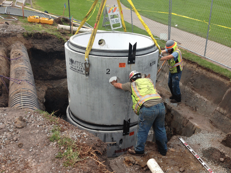 Wet Well Riser Being Guided Into Place