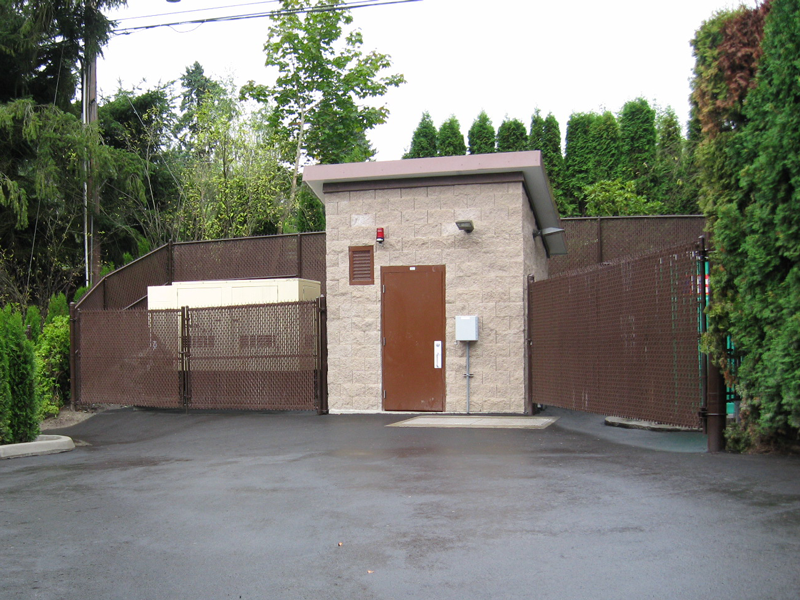 Utility Control Building with Fenced Enclosure Around Pump Station