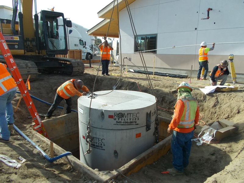 Contractors Installing Underground Concrete Wet Well Structure