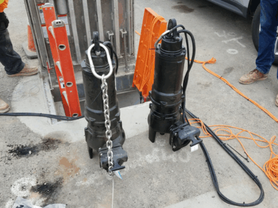 ebara-submersible-pumps-for-condo-development Pair of Identical Pumps with Lifting Chains