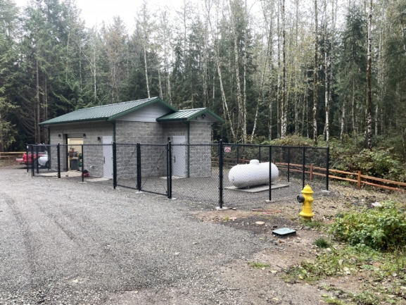 Fenced Enclosure Housing Pump Station and Companion Systems