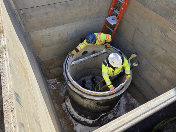 Installation of a commercial sewer lift station in New England.