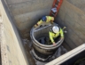 Installation of a commercial sewer lift station in New England.