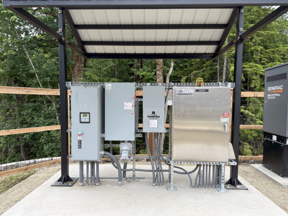Control panel for a wastewater pump station covered by a two-post shelter in Port Orchard, Washington
